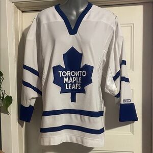 CCM White and Blue Toronto Maple Leafs Hockey Jersey. comes with free hat